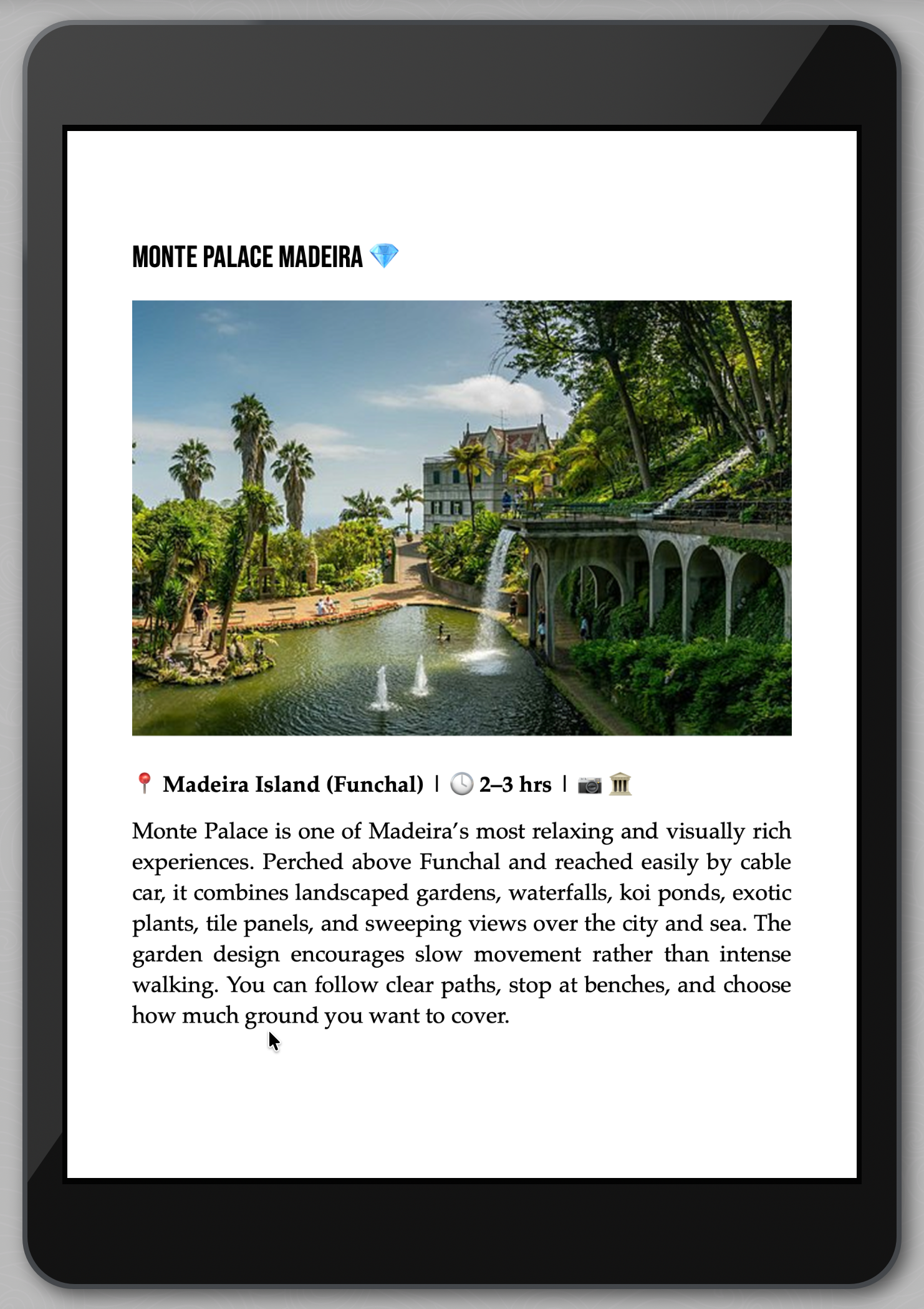Tablet displaying a travel guide with an image of Monte Palace Madeira on Madeira Island.